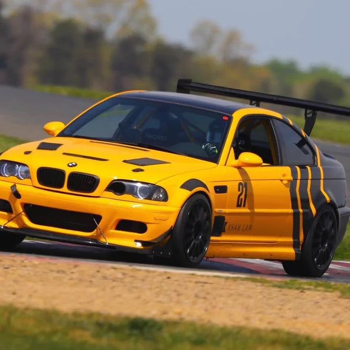 picture of our hood vents on a yellow BMW E46 track car